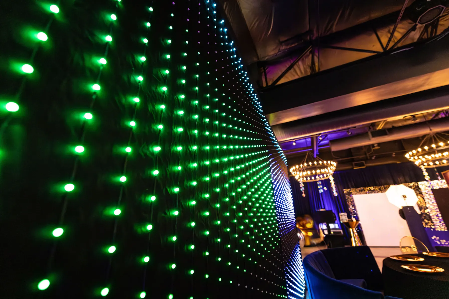 Elegant ballroom with blue LED wall and immersive event lighting