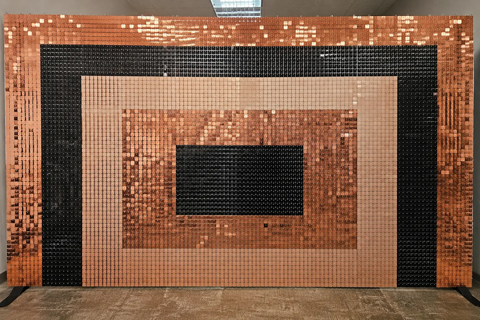 Rose gold and black patterned shimmer wall