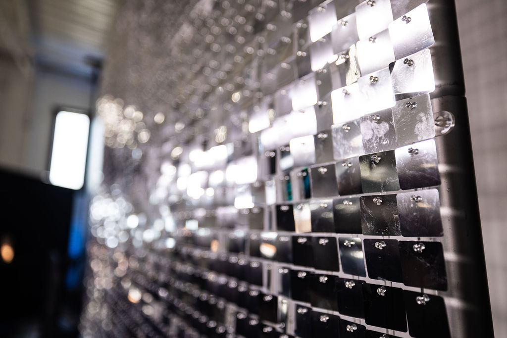 Close-up detail of a silver shimmer wall