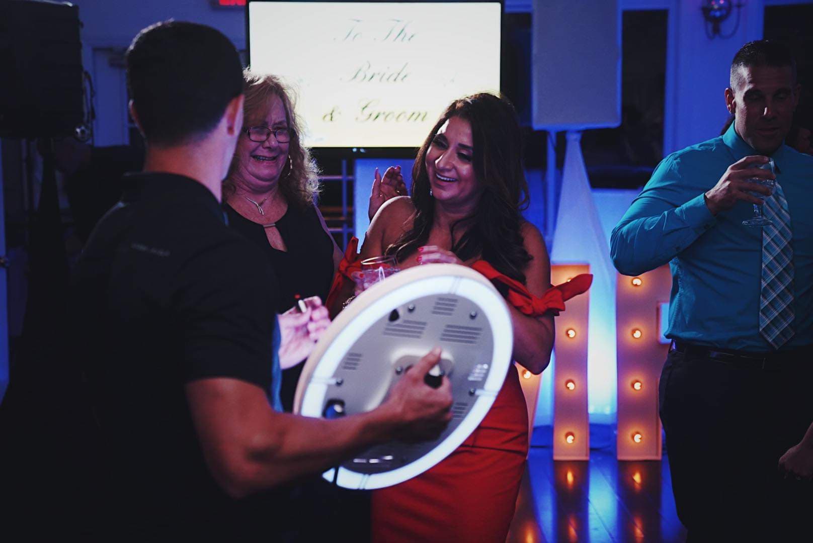 Ring light photo booth capture at an event