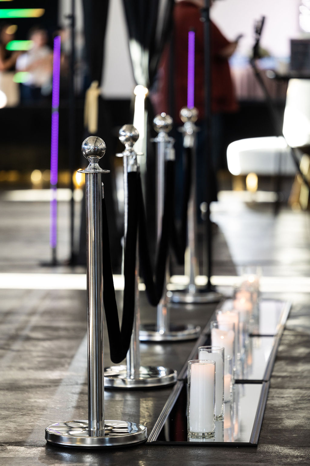 Luxury red carpet stanchion and candle setup