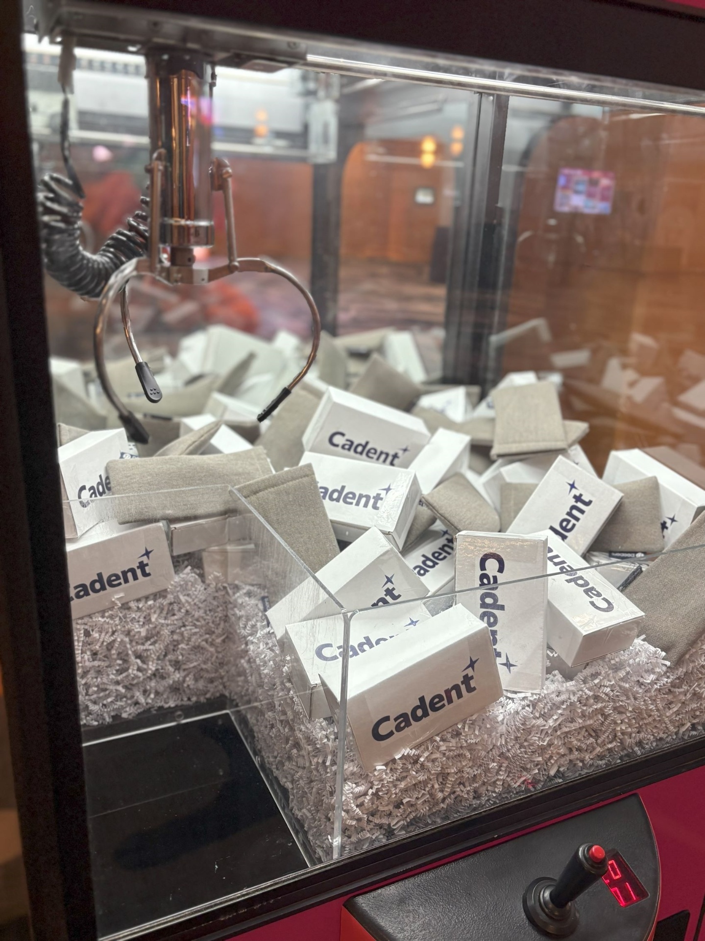 Cadent branded claw machine